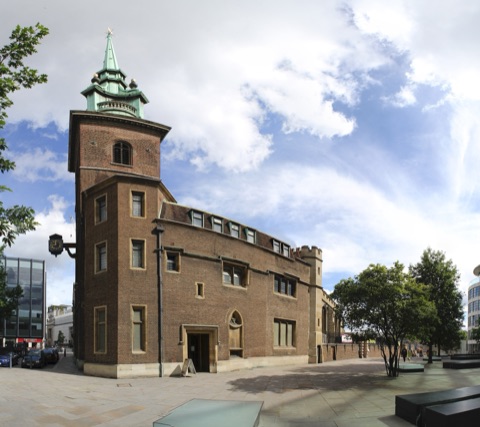 All Hallows by the Tower: a brick church with a green copper spire on its tower