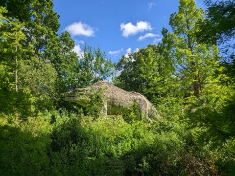 "The Crystal Palace Dinosaurs are a series of sculptures of dinosaurs and other extinct animals, inaccurate by modern standards, in the London borough of Bromley's Crystal Palace Park."
