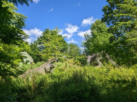 "The Crystal Palace Dinosaurs are a series of sculptures of dinosaurs and other extinct animals, inaccurate by modern standards, in the London borough of Bromley's Crystal Palace Park."