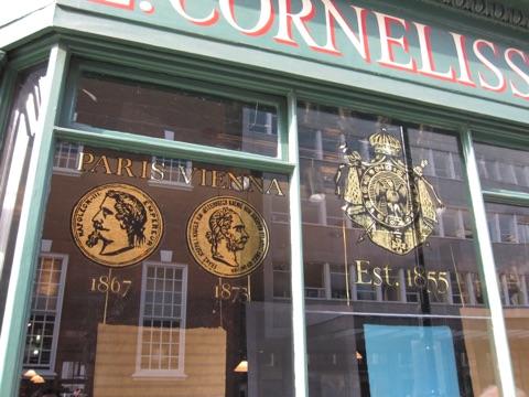 The shopfront of L. Cornelissen & Son on Great Russell Street, with jars of pigment in the window
