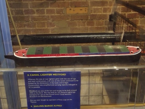 A canal lighter on display inside the London Canal Museum's old ice warehouse