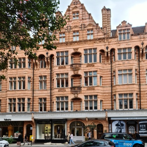 Pink terracotta and red brick along Mount Street
