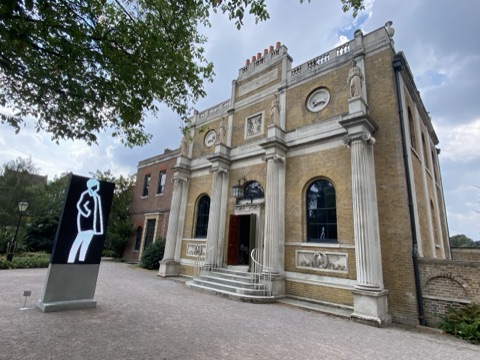Pitzhanger Manor's columned yellow-brick front, a modern sculpture on the drive
