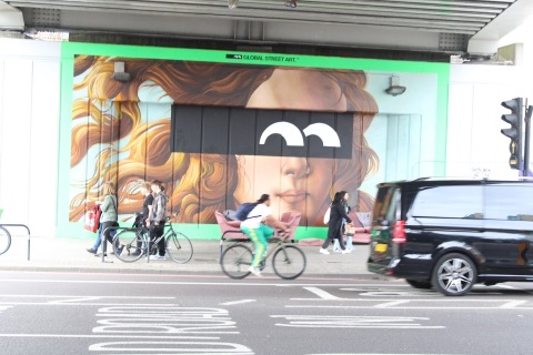 A mural under the Overground bridge on Shoreditch High Street