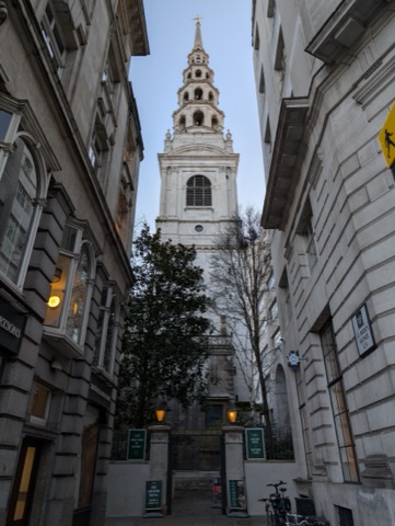 St Bride's tiered spire above the roofs off Fleet Street