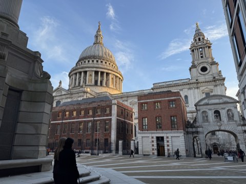 Paternoster Square with the dome of St Paul's above the rooftops and Temple Bar's arch to the right
