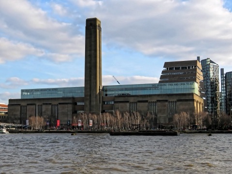 Tate Modern from across the Thames: the long brick power station and its single chimney