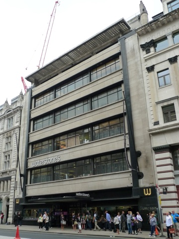 The 1936 Simpson's building on Piccadilly from across the road: six storeys of long ribbon windows between bands of pale stone, Waterstone's on the fascia and the old Simpson's name still by the door, a crowd on the pavement.